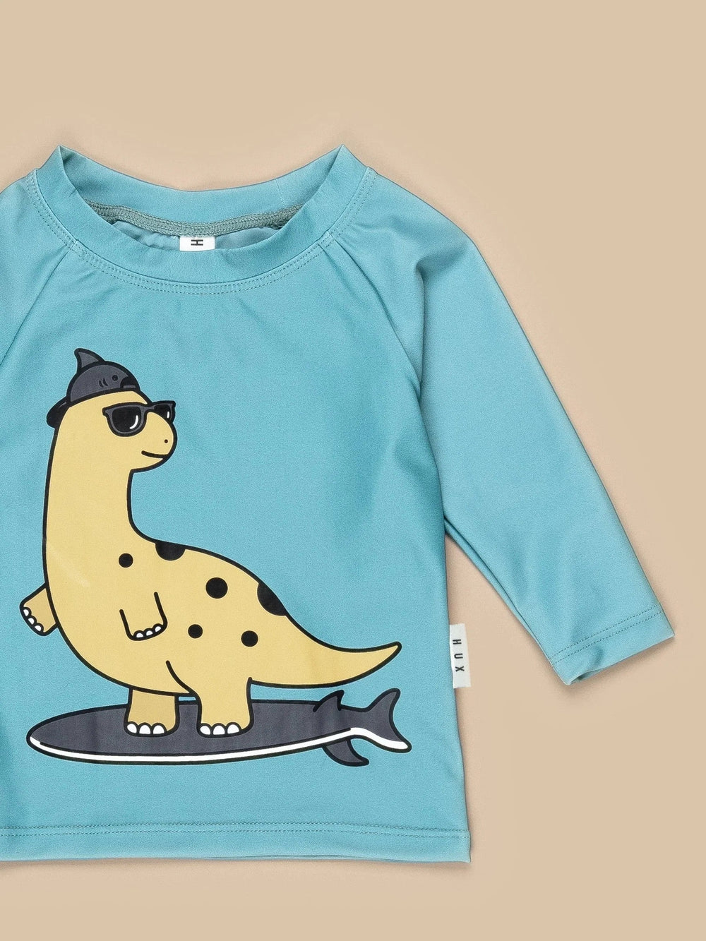 Rashguard, chandail de piscine de Hux imprimé dino qui surf