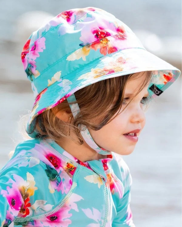 chapeau plage turquoise fleurs roses deux par deux accessoire