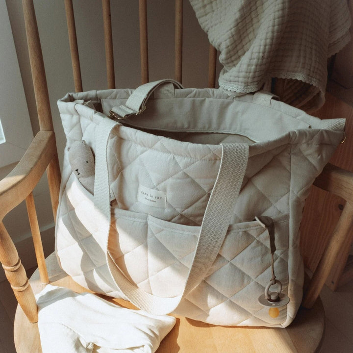 Dans le sac couches crème Mlle et Coco