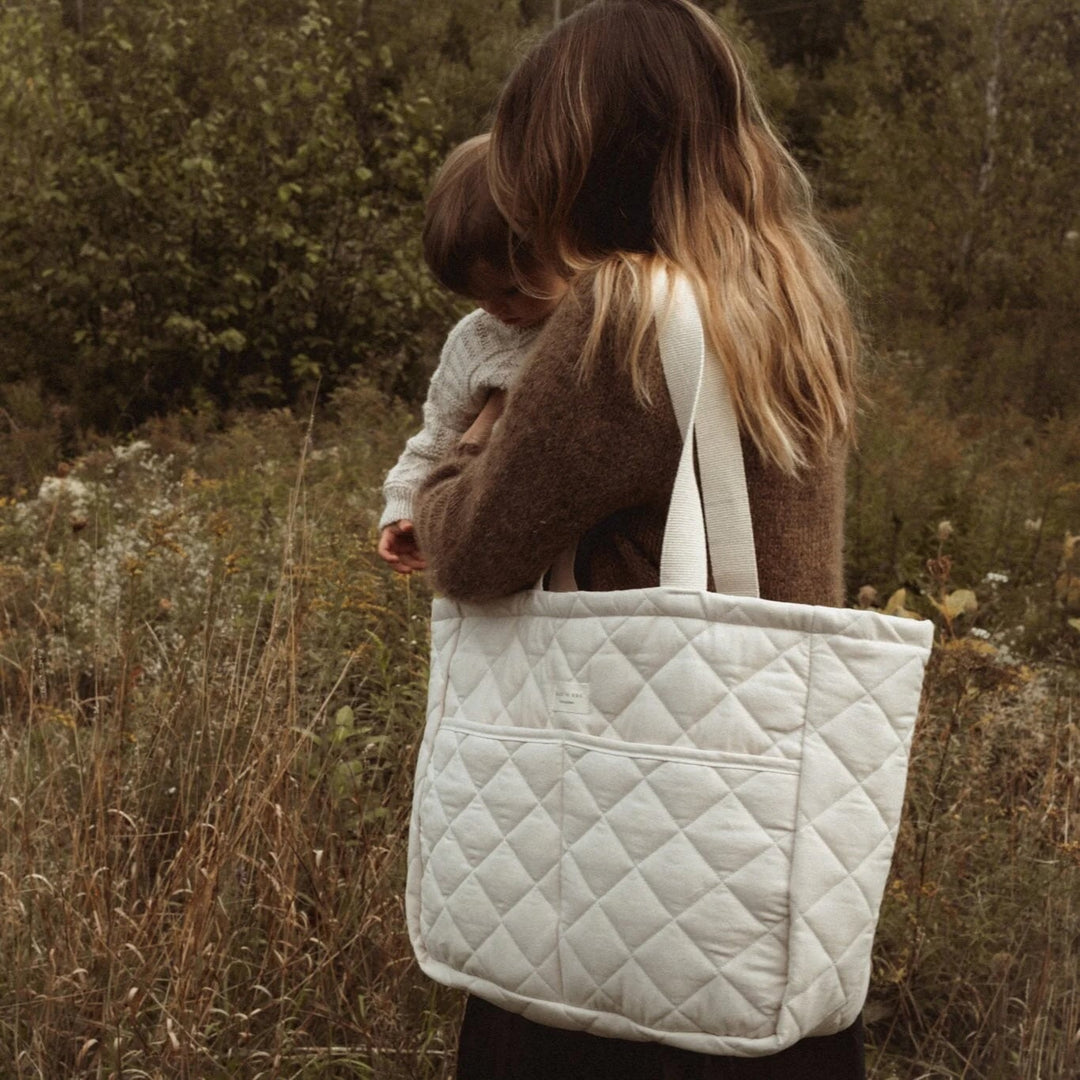 Dans le sac couches crème Mlle et Coco