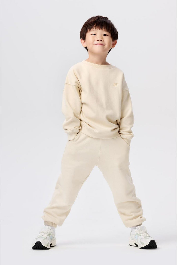 chandail pull col rond Noppies beige Mlle et Coco