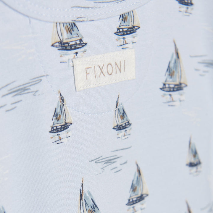 cache-couches bleu motifs bateaux vêtement bébé Fixoni