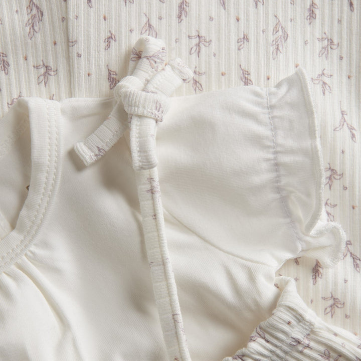 ensemble deux pièces jumper floral mauve cache-couches blanc fixoni