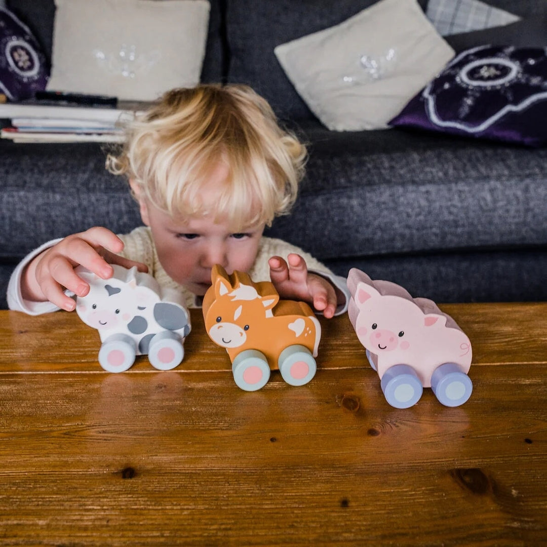 Mon premier jouet à pousser Cochon Orange Tree Toys Mlle et Coco