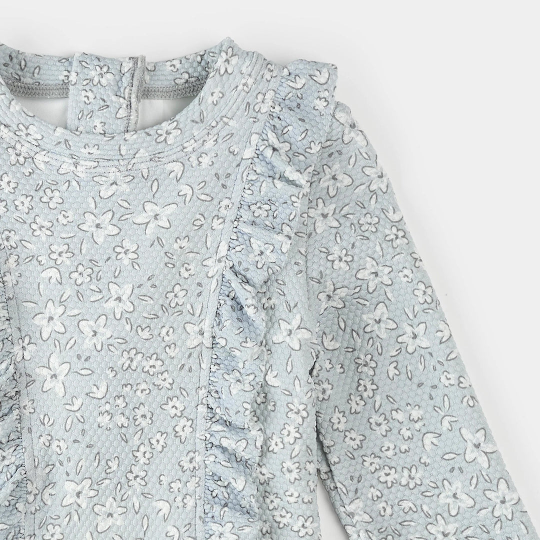 Maillot manches longues une pièce bleu poudre motif fleurs Petit Lem Mlle et Coco