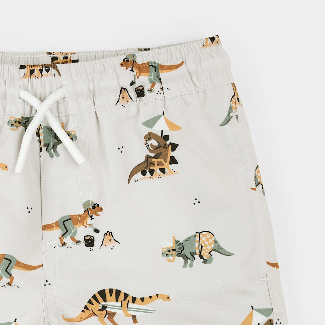 Short maillot de bain beige imprimé dinosaures à la plage Petit Lem Mlle et Coco