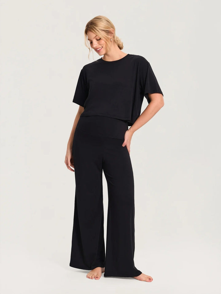 Pantalon de maternité large à revers en coton modal noir Momanda Mlle et Coco