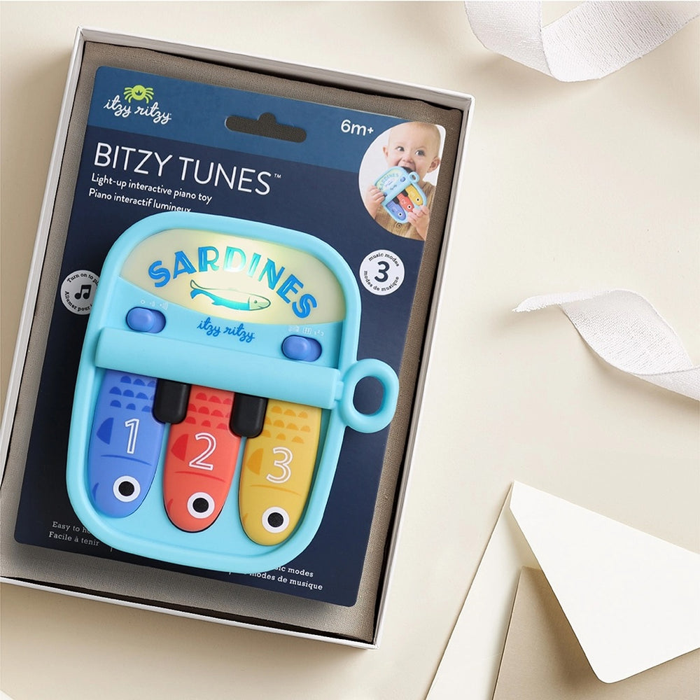 Jouet interactif Bitzy Tunes Sardine Itzy Ritzy Mlle et Coco
