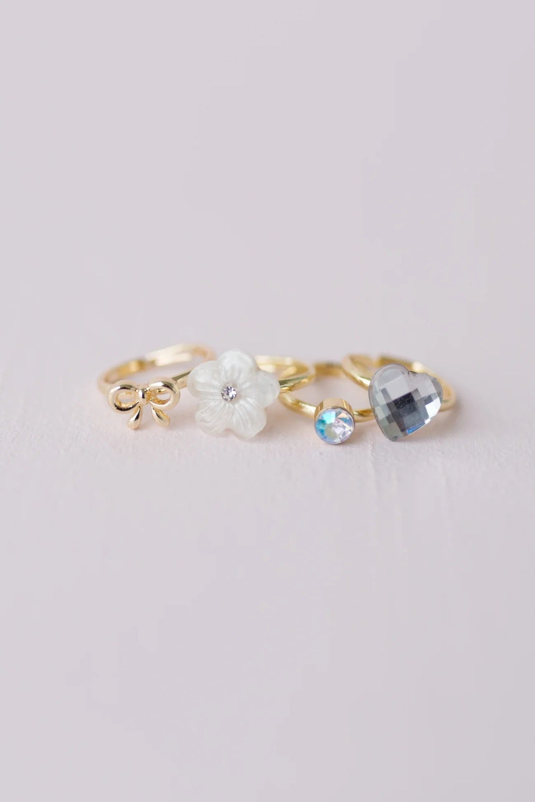 ensemble quatre bagues fleur diamant boucle coeur Great pretenders