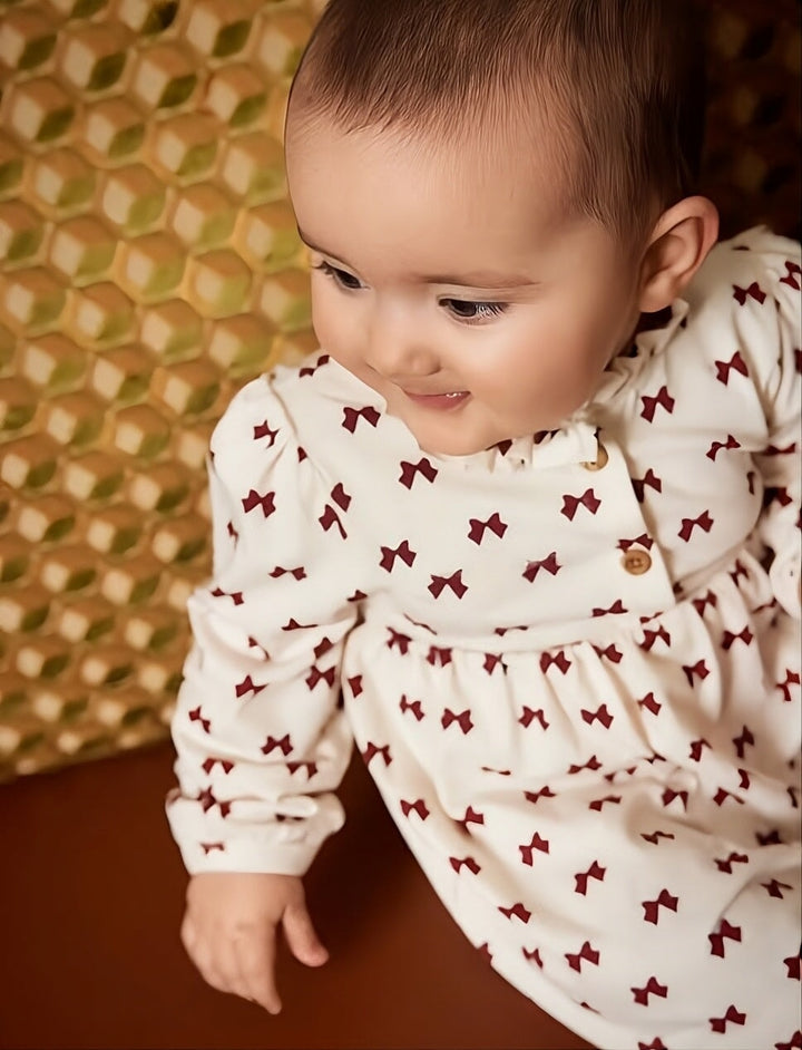 Robe cache-couches Crème et boucle rouge Minymo