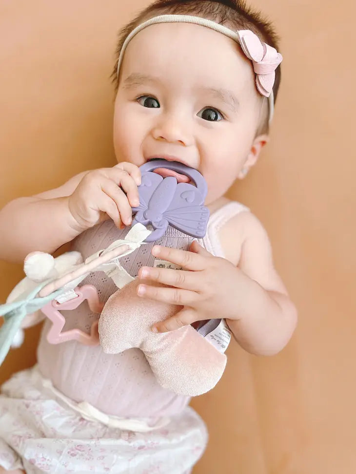 Itzy ritzy jouet eveil sensoriel anneau lapin bebe